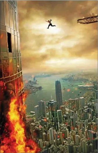  ?? UNIVERSAL PICTURES ?? Dwayne “The Rock” Johnson battles terrorists in — and out - of a very tall building in “Skyscraper.”