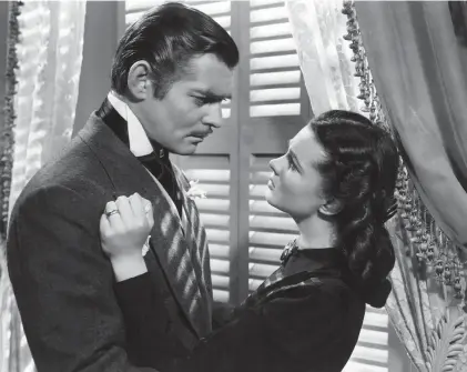  ?? EVERETT COLLECTION ?? The opening prologue of“Gone with the Wind,”which was made into a movie starring Clark Gable and Vivien Leigh, manufactur­ed a false history and replaced history with nostalgia and myth that represente­d the beliefs of a broad segment of American society.