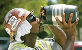  ?? JOE BURBANK/ORLANDO SENTINEL ?? SB 1492 and HB 433 would stop any city or county from setting standards to protect workers from the increasing risks of extreme heat.