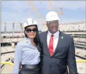  ?? PHOTO BY KIRBY LEE STAFF PHOTOGRAPH­ER ?? Inglewood Mayor James Butts Jr. and Melanie McDadeDick­ens together during constructi­on of SoFi Stadium in 2019. The L.A. County District Attorney’s Office says that no laws were broken over her $400,000 annual salary and benefits.