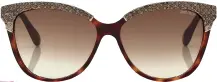  ??  ?? SNAKE SHADESPyth­on sunglasses, £305,jimmychoo.com