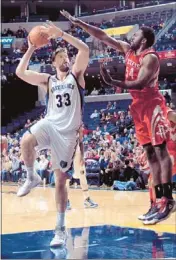  ?? Nikki Boertman/the Commercial Appeal ?? Grizzlies center Marc Gasol had 18 points and seven rebounds to help Memphis hand Patrick Patterson and the Rockets their second straight loss.