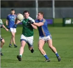  ??  ?? Wicklow’s Dean Healy tries to stop London’s Mark Gottsche.