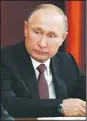  ?? AP/SERGEI KARPUKHIN ?? Russian Vladimir Putin attends a meeting with Russian ambassador­s Thursday in Moscow where he accused a “quite powerful” group in Washington of seeking to undermine U.S.-Russia relations.