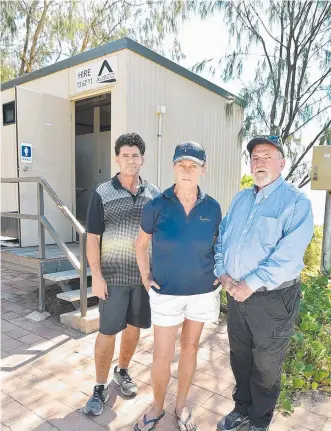  ?? CRYING FOUL: Adrian Dall'Oste, Julie Carmody and Rick Vernon are up in arms with the council failing to upgrade the toilet block at Horseshoe Bay after Cyclone Yasi. Picture: FIONA HARDING ??