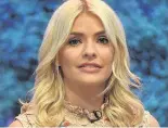  ??  ?? BLONDE LOCKS Telly’s Holly Willoughby