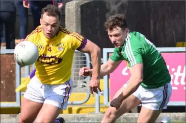  ??  ?? Conor Carty on the move out of defence for Wexford.