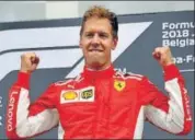  ?? AFP ?? After winning the Belgian GP on Sunday, Sebastian Vettel trails Lewis Hamilton by 17 points going into the Italian GP.