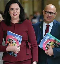  ?? PHOTO: DAN PELED ?? ELECTION-BOUND: Queensland Premier Annastacia Palaszczuk with Treasurer Curtis Pitt before he handed down yesterday’s budget.