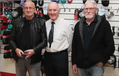  ??  ?? Mick Maher and Tony Rooney travelled from Dublin for the famous sale in The Sound Shop, they are pictured with owner Tommy Leddy.