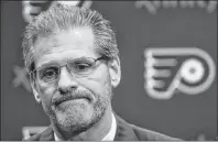  ?? AP PHOTO ?? In this April 11, 2016, file photo, Philadelph­ia Flyers general manager Ron Hextall speaks with members of the media in Voorhees, N.J.