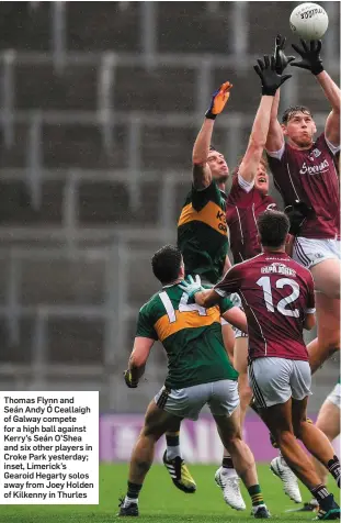  ??  ?? Thomas Flynn and Seán Andy Ó Ceallaigh of Galway compete for a high ball against Kerry’s Seán O’Shea and six other players in Croke Park yesterday; inset, Limerick’s Gearoid Hegarty solos away from Joey Holden of Kilkenny in Thurles