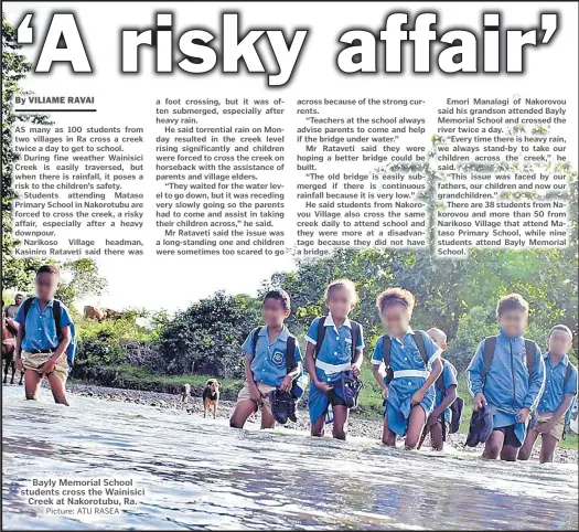  ?? Picture: ATU RASEA ?? Bayly Memorial School students cross the Wainisici Creek at Nakorotubu, Ra.