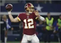  ?? ASSOCIATED PRESS FILE ?? With starting quarterbac­k Alex Smith done for the year after suffering an ugly broken leg, the Redskins have been trying to roll with quarterbac­k Colt McCoy.