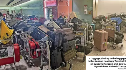  ?? Pictures: PA ?? Luggage piled up in the baggage hall at London Heathrow Terminal 2 on Sunday afternoon and, below, Ryanair boss Michael O’Leary