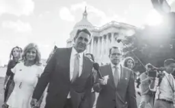  ?? Andrew Harnik, The Associated Press ?? Sen. Jeff Flake, R-ariz., is accompanie­d by his wife Cheryl as he leaves the U.S. Capitol on Oct. 24 after announcing he won’t seek re-election in 2018. In his announceme­nt on the Senate floor, Flake delivered a sharp rebuke to President Donald Trump.