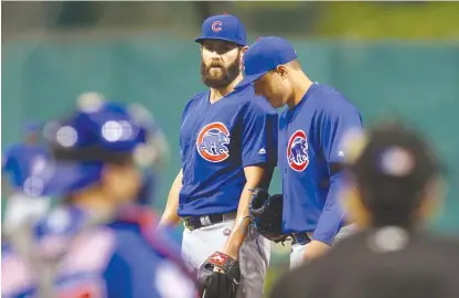  ?? | GETTY IMAGES ?? Jake Arrieta’s ERA went from 2.85 to 3.10 after he allowed seven earned runs and 10 hits against the Pirates.