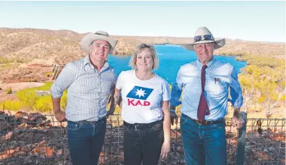  ??  ?? RELOCATION POLICY: Katter’s Australian Party members Rob Katter, Thuringowa candidate Julianne Wood and Bob Katter inspect the Lake Julius Reserve area as part of their plan for a relocation site for troubled youth.