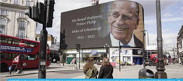  ??  ?? GLASGOW: Billboards with an image of Britain’s Prince Philip, Duke of Edinburgh are displayed alongside the Clydeside Expressway in Glasgow, Scotland on Friday after the announceme­nt of the death of Britain’s Prince Philip, Duke of Edinburgh. —AFP