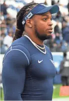  ?? CHRISTOPHE­R HANEWINCKE­L/USA TODAY SPORTS ?? The Titans gave running back Derrick Henry another week to rest his hamstring ahead of an AFC showdown.