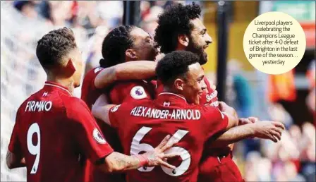  ??  ?? Liverpool players celebratin­g the Champions League ticket after 4-0 defeat of Brighton in the last game of the season… yesterday