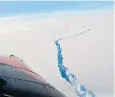  ??  ?? The rupture line, filmed from above, before the large mass of ice split away completely