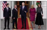  ?? (AP/Evan Vucci) ?? President Joe Biden (center) and first lady Jill Biden greet Jordan’s King Abdullah II (second left), Queen Rania and Crown Prince Hussein (left) on the North Portico of the White House on Monday in Washington.