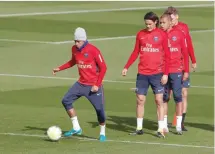  ?? — Reuters ?? Paris Saint-Germain’s Neymar, Edinson Cavani and Kylian Mbappe during training.