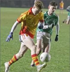  ??  ?? Luke Murphy (Sarsfields) is chased by Dylan Cooke-Leonard.