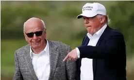  ?? Photograph: Carlo Allegri/Reuters ?? Donald Trump speaks to Rupert Murdoch at Trump Internatio­nal Golf Links in Aberdeen, in June 2016.