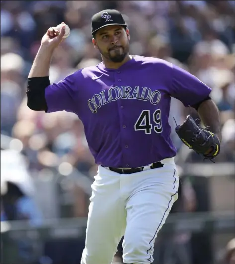  ?? DAVID ZALUBOWSKI — ASSOCIATED PRESS ?? Colorado Rockies starting pitcher Antonio Senzatela looks to throw the ball after taking a single off the right shin off the bat of Chicago White Sox’s Leury Garcia in the seventh inning on Wednesday in Denver.