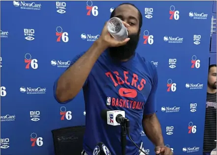  ?? THE ASSOCIATED PRESS ?? James Harden takes a gulp of water after practice Sunday. The Sixers are hopeful his veteran savvy and skills will help overcome the loss of MVP candidate Joel Embiid in the third two games of their best of seven playoff series against the Miami Heat that begins Monday.