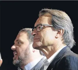  ?? PAU BARRENA / BLOOMBERG ?? Oriol Junqueras y Artur Mas, durante la noche electoral