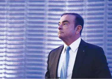  ??  ?? Renault-Nissan Chairman and CEO Carlos Ghosn looks on during a press conference on the Renault strategic plan at La Defense business district in Paris yesterday. (AFP)