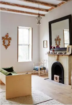  ??  ?? MAIN BEDROOM Above Bastien designed the modern sofa
Opposite Customised de Gournay Tree of Life wallpaper frames the bed