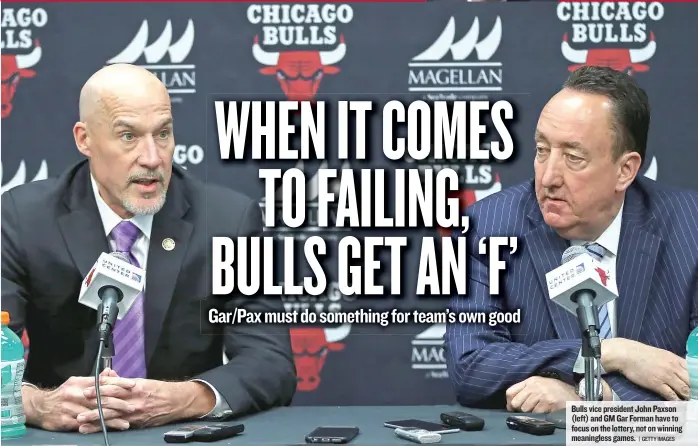  ??  ?? Bulls vice president John Paxson ( left) andGMGar Forman have to focus on the lottery, not on winning meaningles­s games.