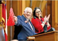  ?? THE ASSOCIATED PRESS ?? House Speaker David Ralston waves a pom pom Monday in honor of Georgia’s appearance in the NCAA college football championsh­ip game against Alabama as Georgia’s legislativ­e session adjourns.