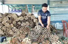  ?? — Bernama photo ?? Zulazrai says the bamboos are sorted by length, diameter and quality before being bundled for sale.