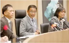  ?? — Photo by Chimon Upon ?? Abdul Karim delivers his remarks during the press conference. He is flanked by his ministry’s permanent secretary Hii Chang Kee (left) and STB chief executive officer Sharzede Salleh Askor.