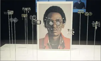  ?? [JOHN BAZEMORE/THE ASSOCIATED PRESS] ?? Wire eyeglasses are shown in the exhibit “Making Africa: A Continent of Contempora­ry Design.”