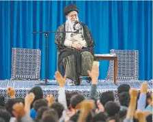  ?? Office of the Iranian Supreme Leader ?? Iran’s Supreme Leader Ayatollah Ali Khamenei meets with students as they chant slogans, in Tehran, Iran, in this picture released on May 22, 2019, by an official website of his office.