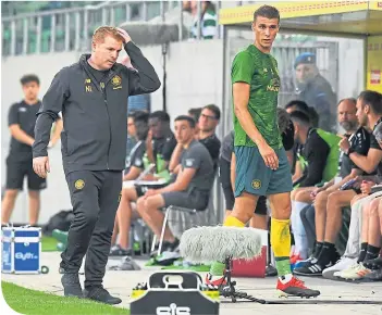  ??  ?? Neil Lennon seemed stunned by Jozo Simunovic’s red card in Switzerlan­d