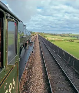  ?? ?? Steam trains passing over Rutland’s 1275-yard 82-arch Harringwor­th Viaduct have long been a major draw for lineside photograph­ers. However, on October 16, the Bahamas Locomotive Society’s John Hillier took this very different view from the footplate while No. 45596 was crossing the longest masonry viaduct in the UK during the Railway Touring Company’s trip from Ealing Broadway to York on October 16, the Jubilee’s last train this year. JOHN HILLIER