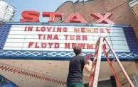  ?? DAY/THE COMMERCIAL APPEAL CHRIS ?? Jeff Kollath, the museum director for the Stax Museum of American Soul Music, climbs up a ladder to finish spelling out Tina Turner's name on the Memphis museum's marquee in remembranc­e of her and Floyd Newman on May 25, 2023. Turner, a two-time Rock 'n' Roll Hall of Famer, a 12-time Grammy winner and one of the most enduring hitmakers in history, and Newman, a baritone saxophonis­t and key figure in the developmen­t of Stax Records, both died earlier that week.