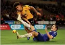  ??  ?? Wolves teenager Morgan Gibbs-White tangles with Andreas Christense­n during a superb full Prmeir League debut. Photograph: Andrew Boyers/Action Images via Reuters