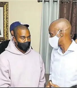  ?? (Photo: Twitter/jovenel Moïse) ?? American rapper Kayne West (left) speaking with Haitian President Jovenel Moïse at the Hugo Chávez Internatio­nal Airport in Cap-haïtien last Friday.