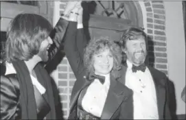  ?? SUZANNE VLAMIS — THE ASSOCIATED PRESS FILE ?? In this file photo, producer Jon Peters, Barbra Streisand and Kris Kristoffer­son appear at a preview of the film, “A Star is Born,” in New York.