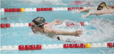  ?? STAFF PHOTO BY NICOLAUS CZARNECKI ?? DOUBLE-WINNER: Duxbury’s Mary Buckley flies ahead of the field to win the 200-yard individual medley, one of two golds for her in yesterday’s Div. 2 state meet at BU.