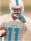  ?? JOHN MCCALL/SUN SENTINEL ?? Dolphins oft-injured receiver DeVante Parker was inactive Sunday and his agent called coach Adam Gase incompeten­t.