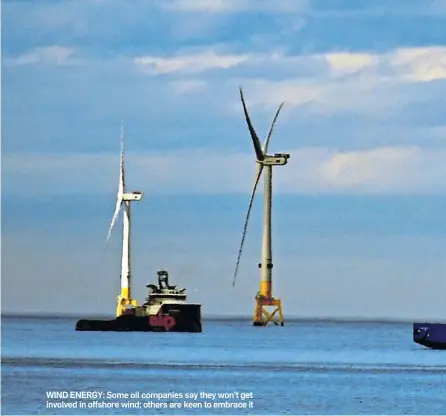  ??  ?? WIND ENERGY: Some oil companies say they won’t get involved in offshore wind; others are keen to embrace it